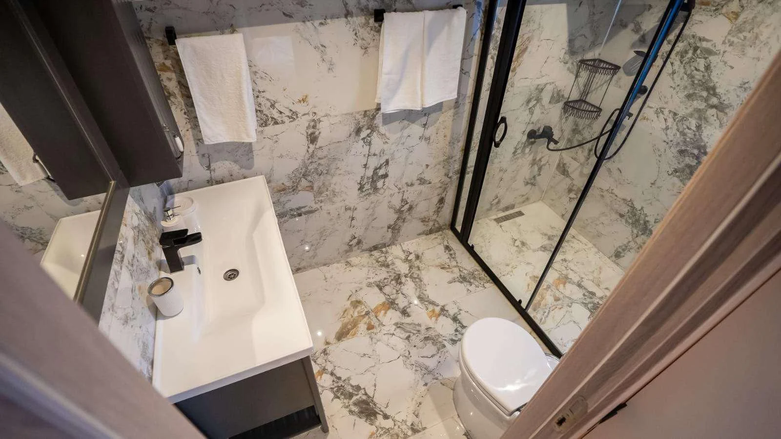 a bathroom with a sink and toilet aboard 88 YACHT Yacht for Sale