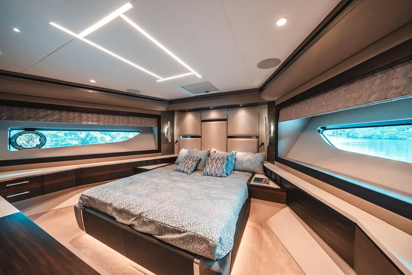a room with a large bed and a large window aboard 88 YACHT Yacht for Sale