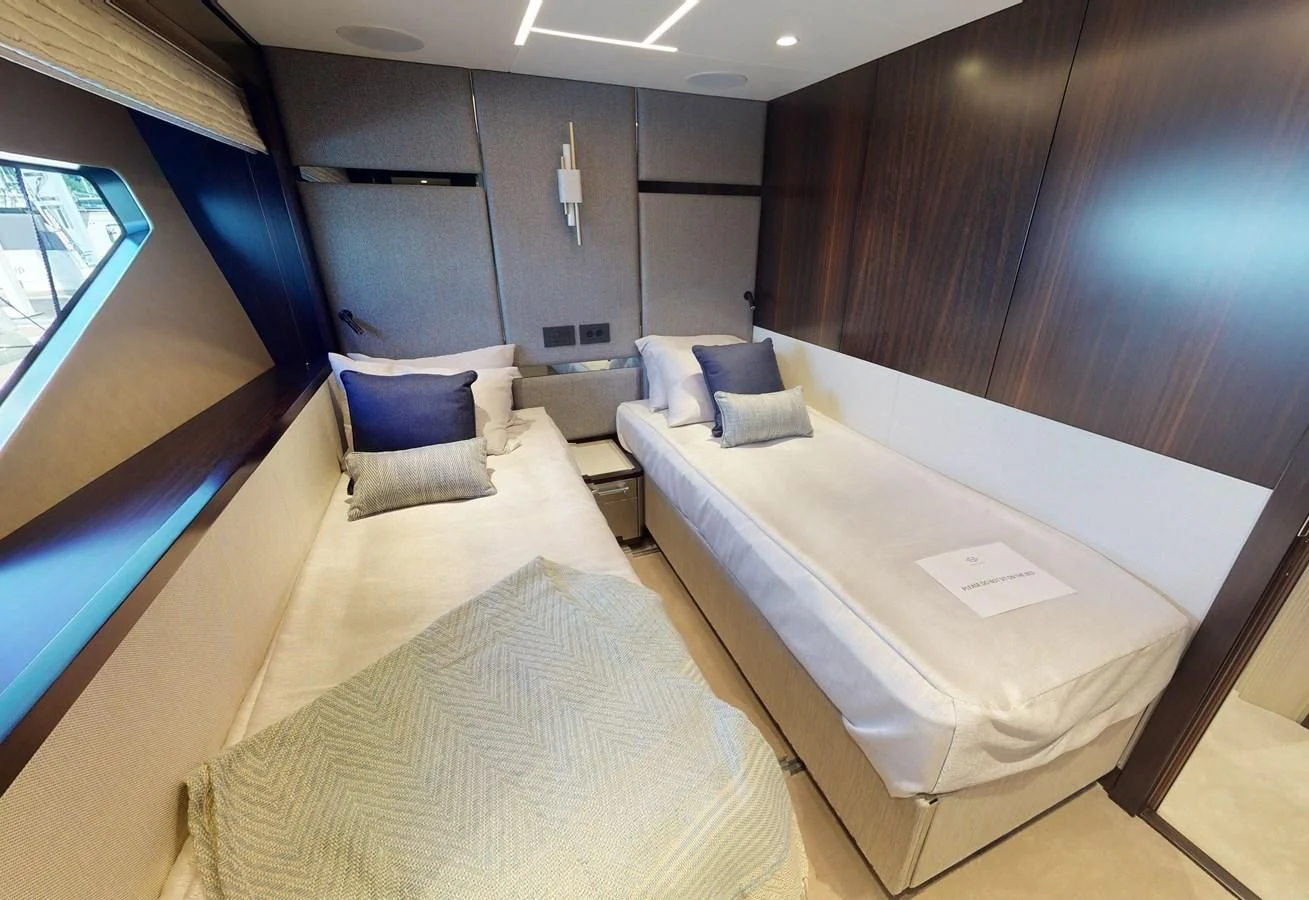 a room with a bed and a window aboard 88 YACHT Yacht for Sale