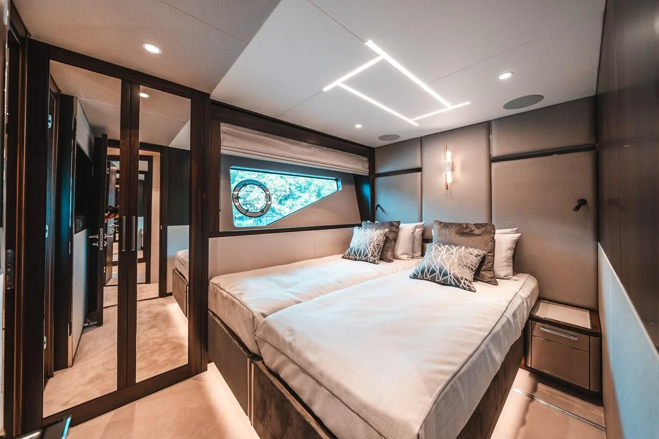 a bedroom with a large bed aboard 88 YACHT Yacht for Sale