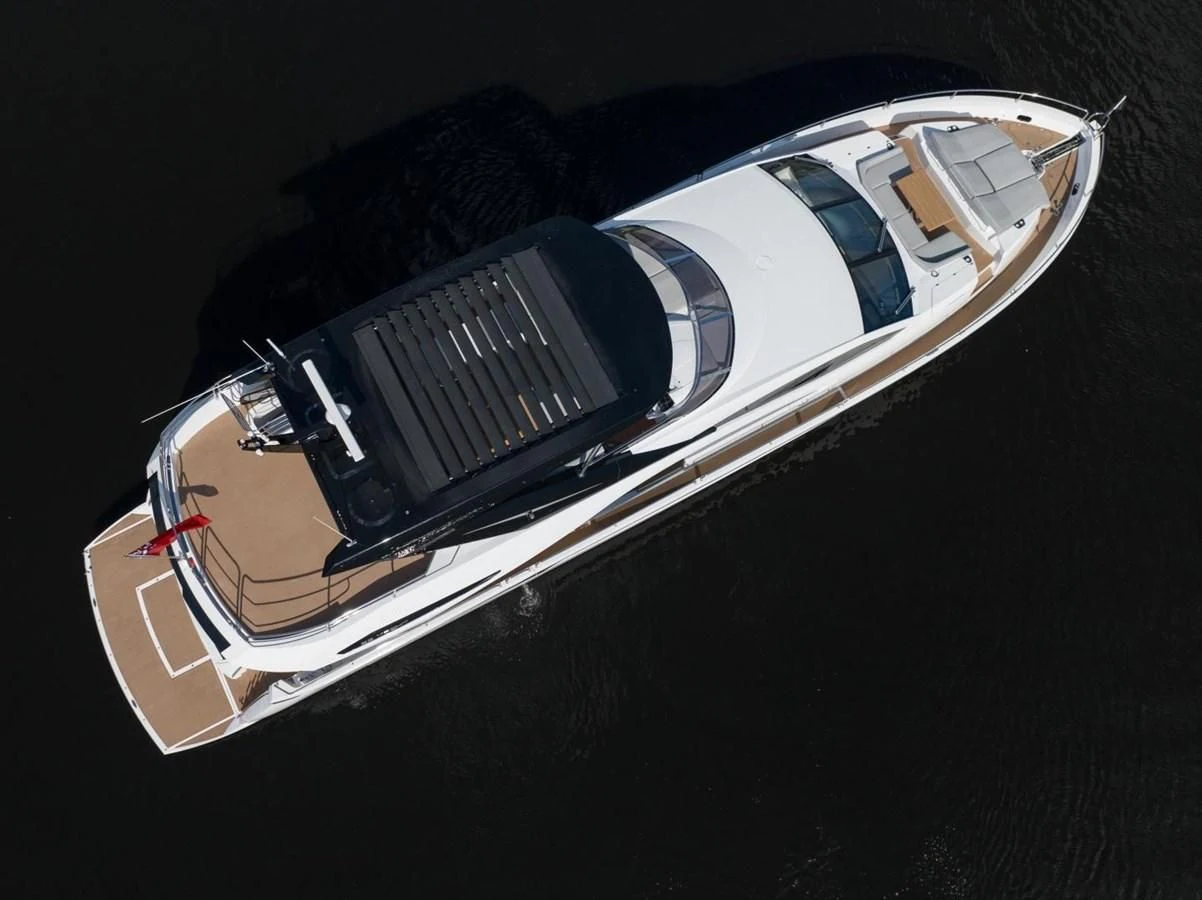 a computer mouse on a black surface aboard 88 YACHT Yacht for Sale