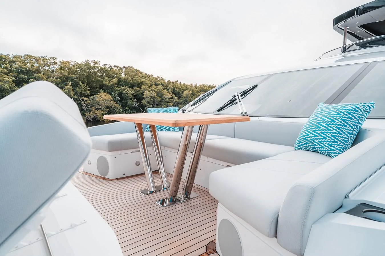 a white car with a table and chairs on a deck aboard 88 YACHT Yacht for Sale