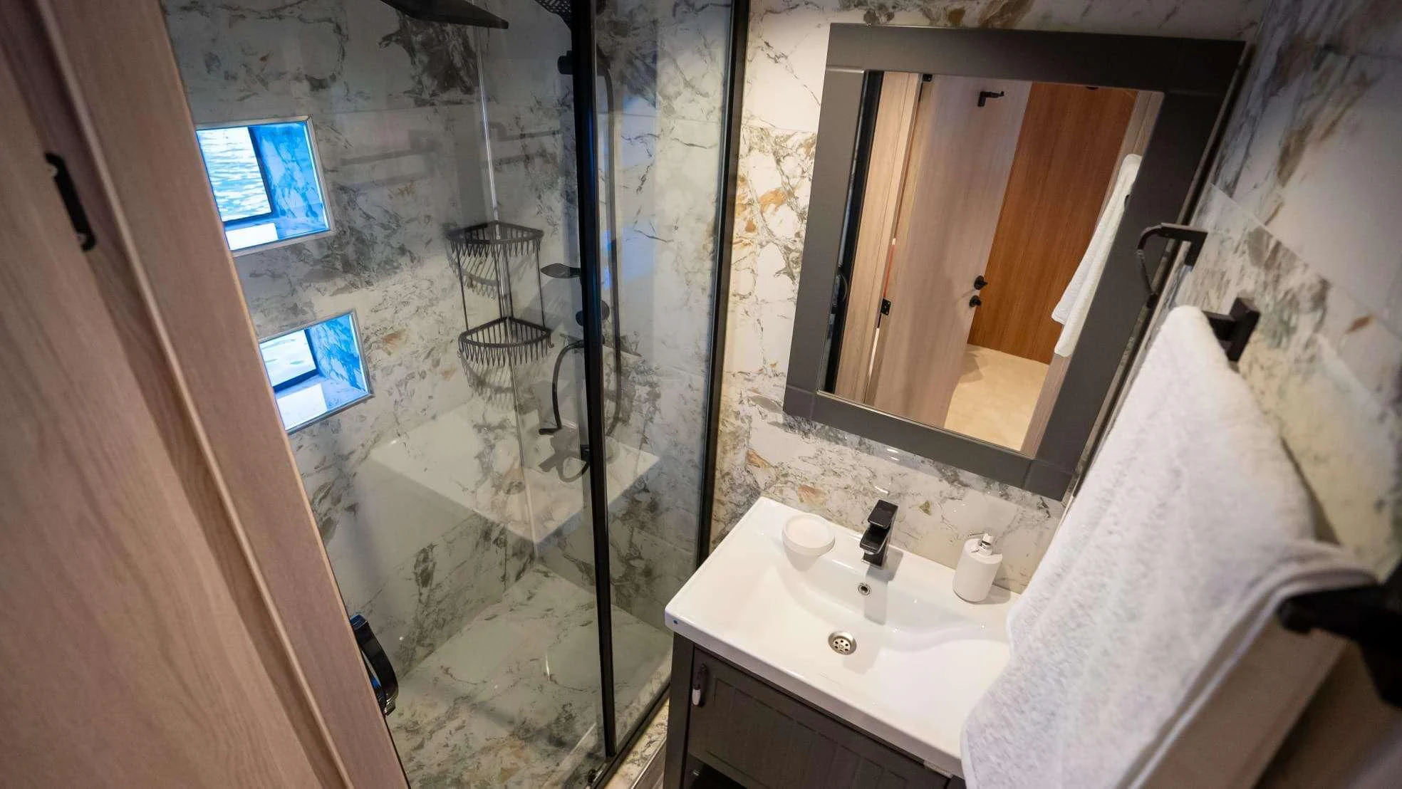 a bathroom with a large mirror aboard 88 YACHT Yacht for Sale