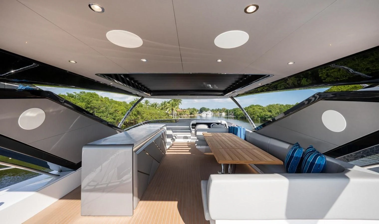 a room with a large deck and a pool table aboard 88 YACHT Yacht for Sale