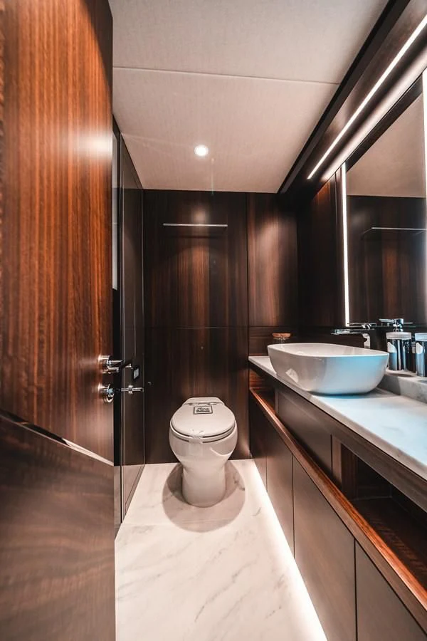 a bathroom with a sink and a toilet aboard 88 YACHT Yacht for Sale