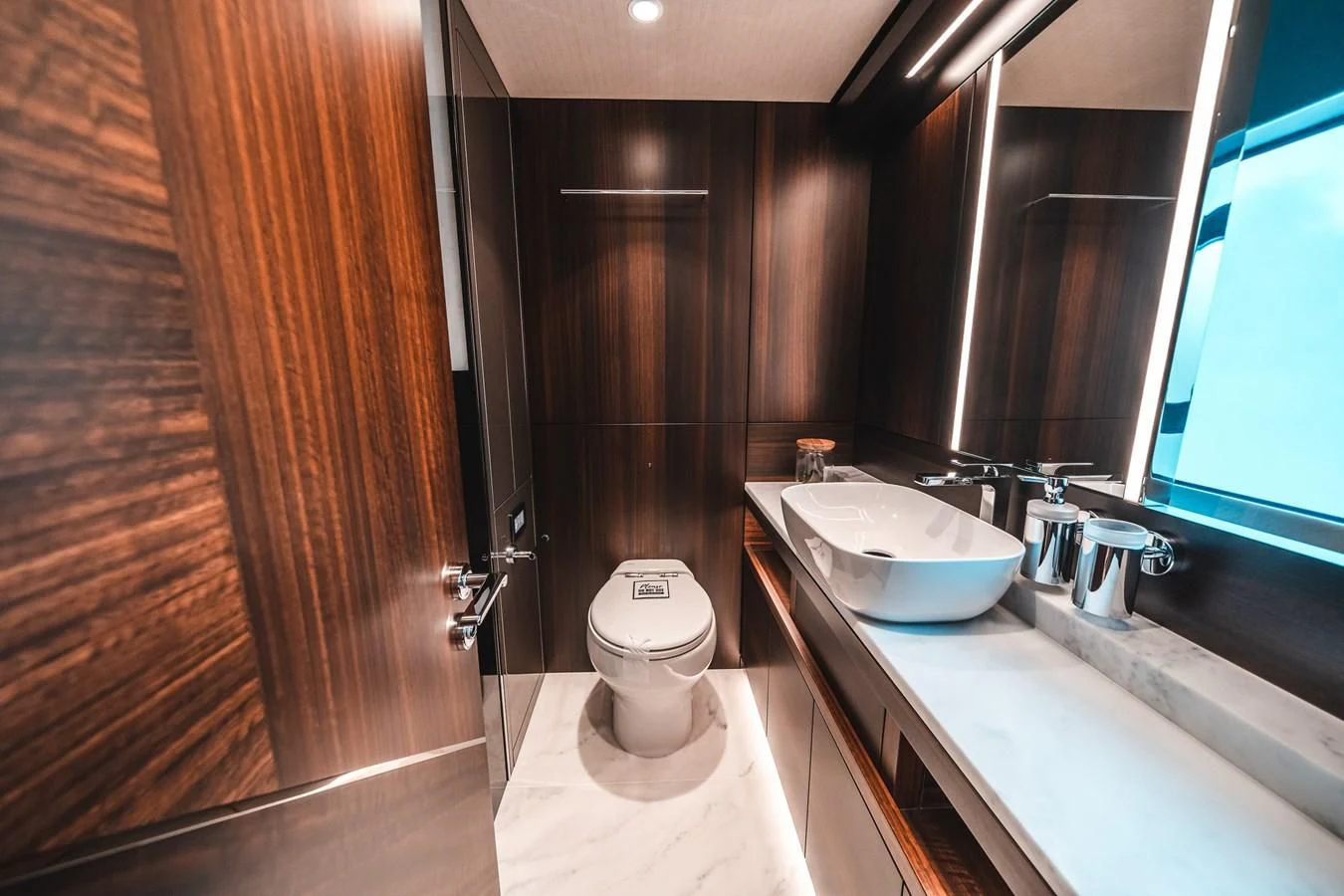 a bathroom with a sink toilet and a bathtub aboard 88 YACHT Yacht for Sale
