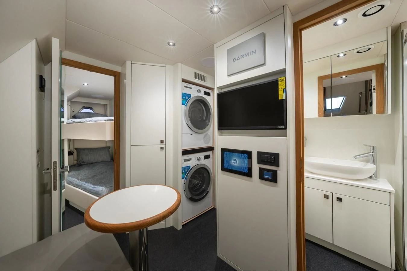 a small kitchen with a small table aboard 88 YACHT Yacht for Sale