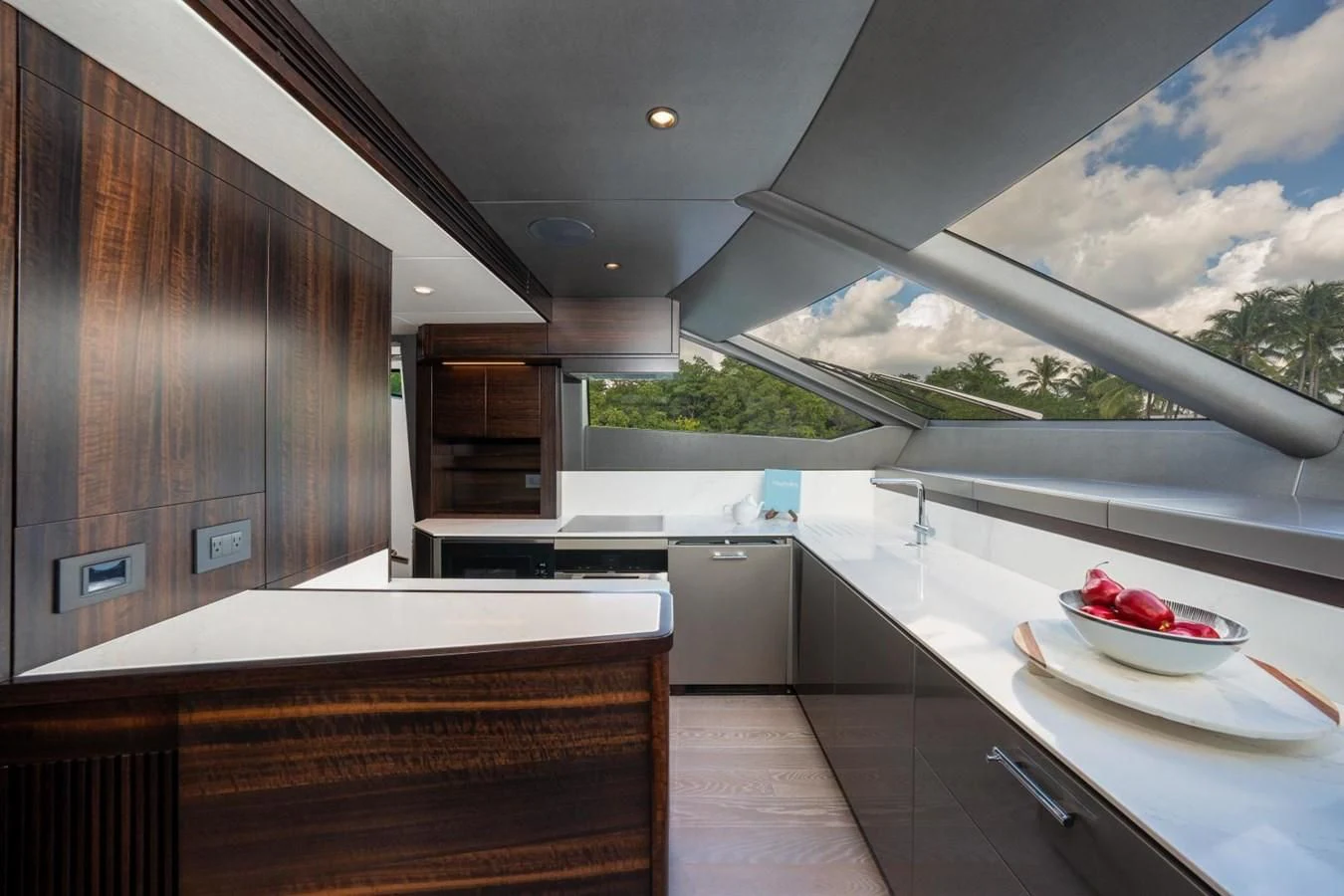 a modern kitchen with a large wooden wall and a large open space aboard 88 YACHT Yacht for Sale