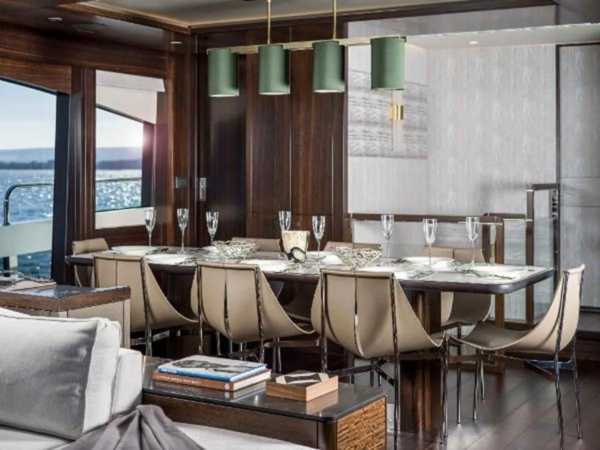 a restaurant with tables and chairs aboard 88 YACHT Yacht for Sale