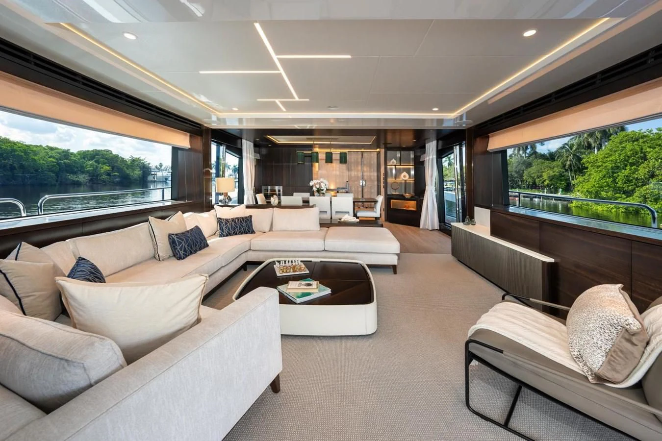 a living room with couches and a table aboard 88 YACHT Yacht for Sale