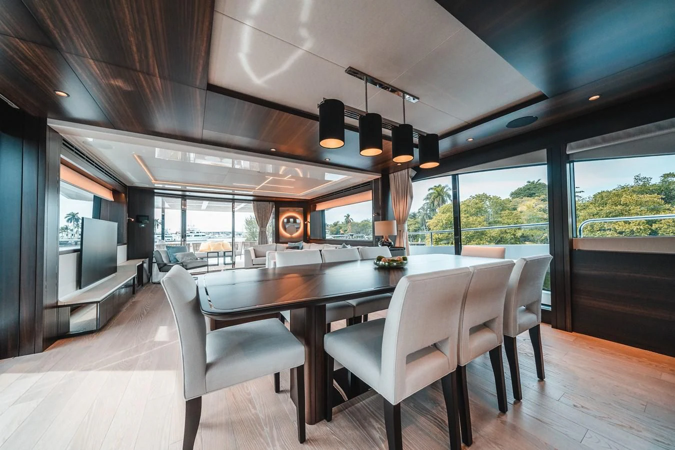 a large kitchen with a dining table aboard 88 YACHT Yacht for Sale