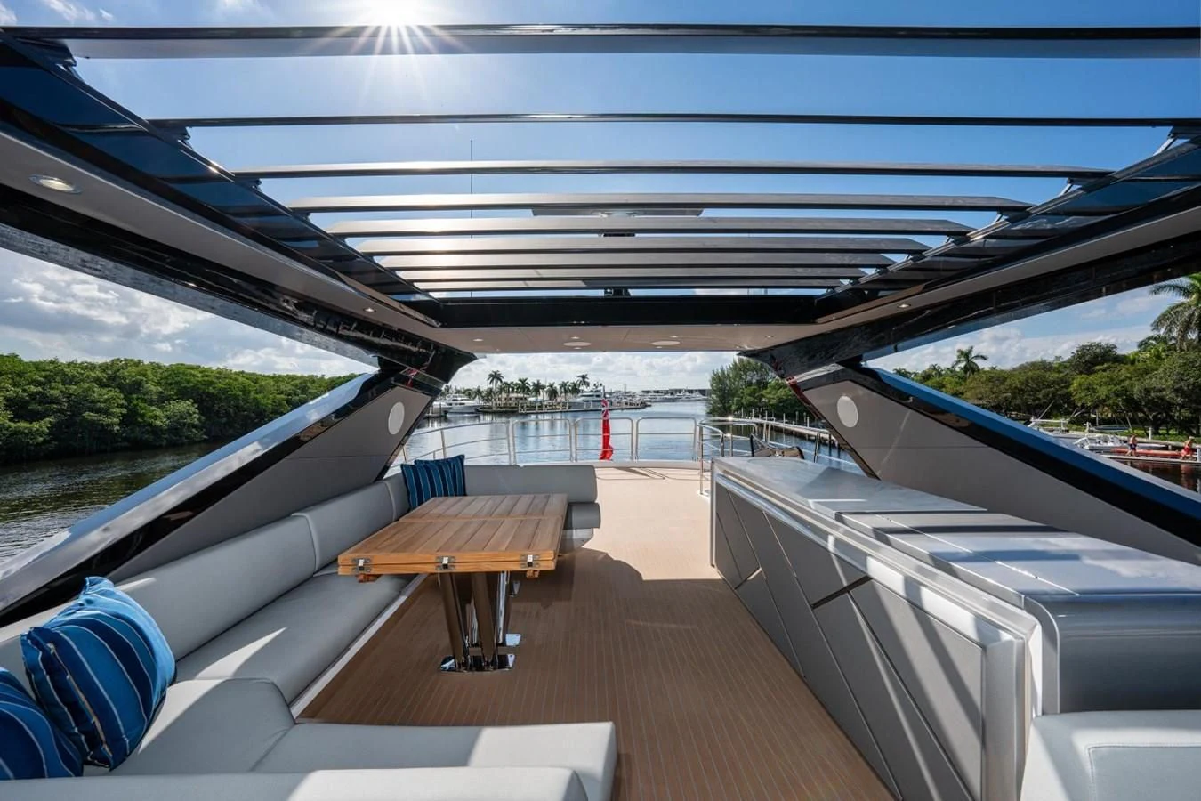 a deck with a view of the water and a dock aboard 88 YACHT Yacht for Sale