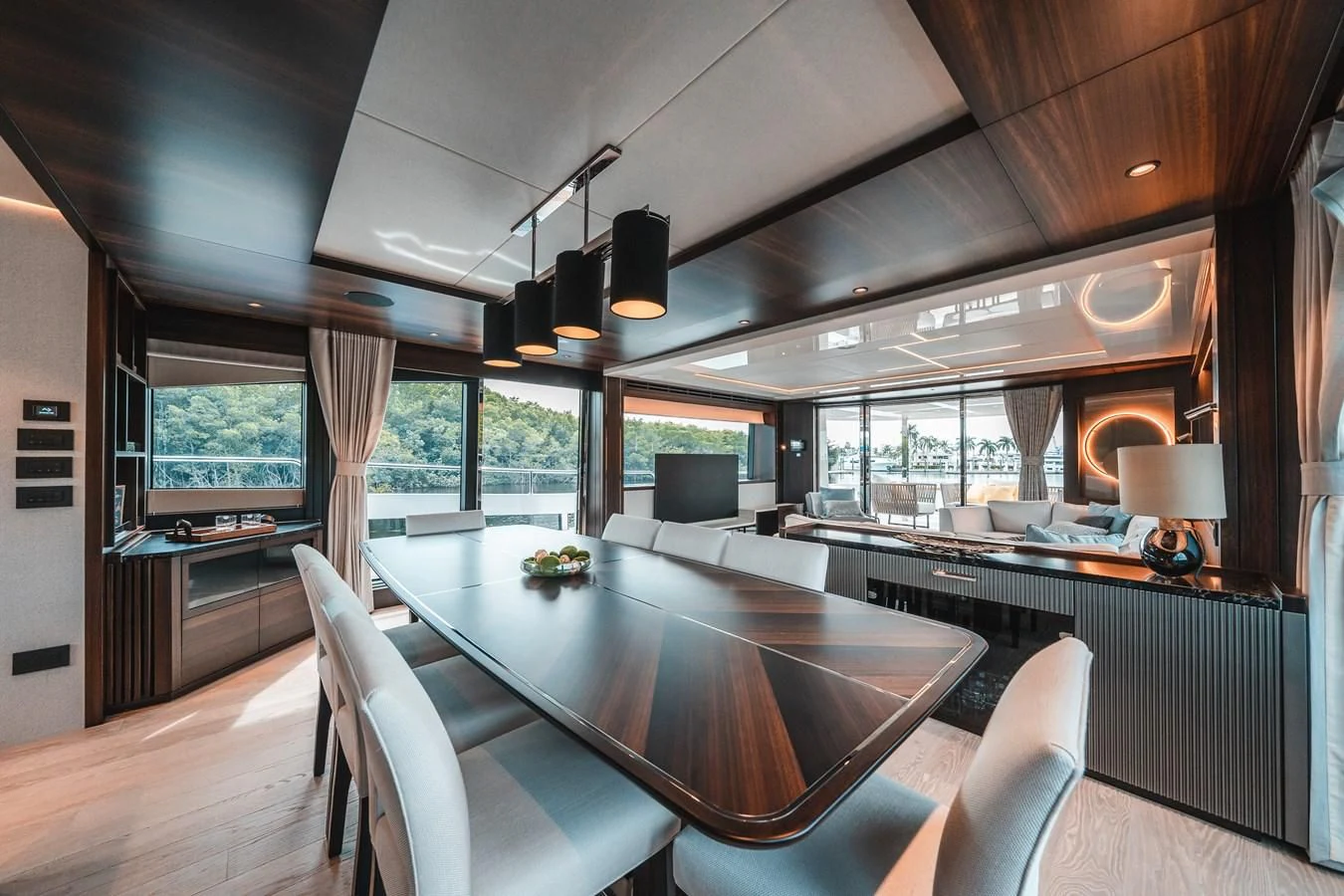 a large kitchen with a dining table aboard 88 YACHT Yacht for Sale