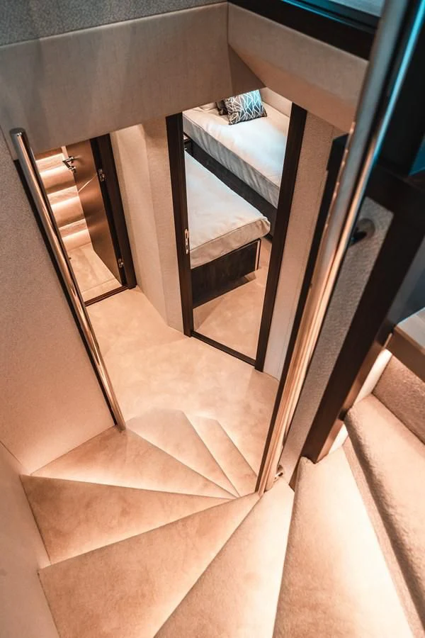 a staircase with a wood railing aboard 88 YACHT Yacht for Sale