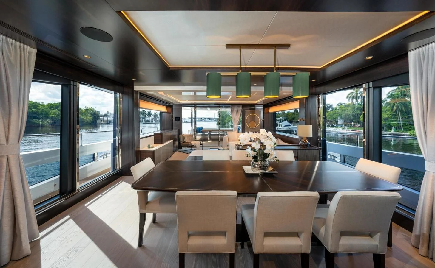 a large kitchen with a dining table aboard 88 YACHT Yacht for Sale