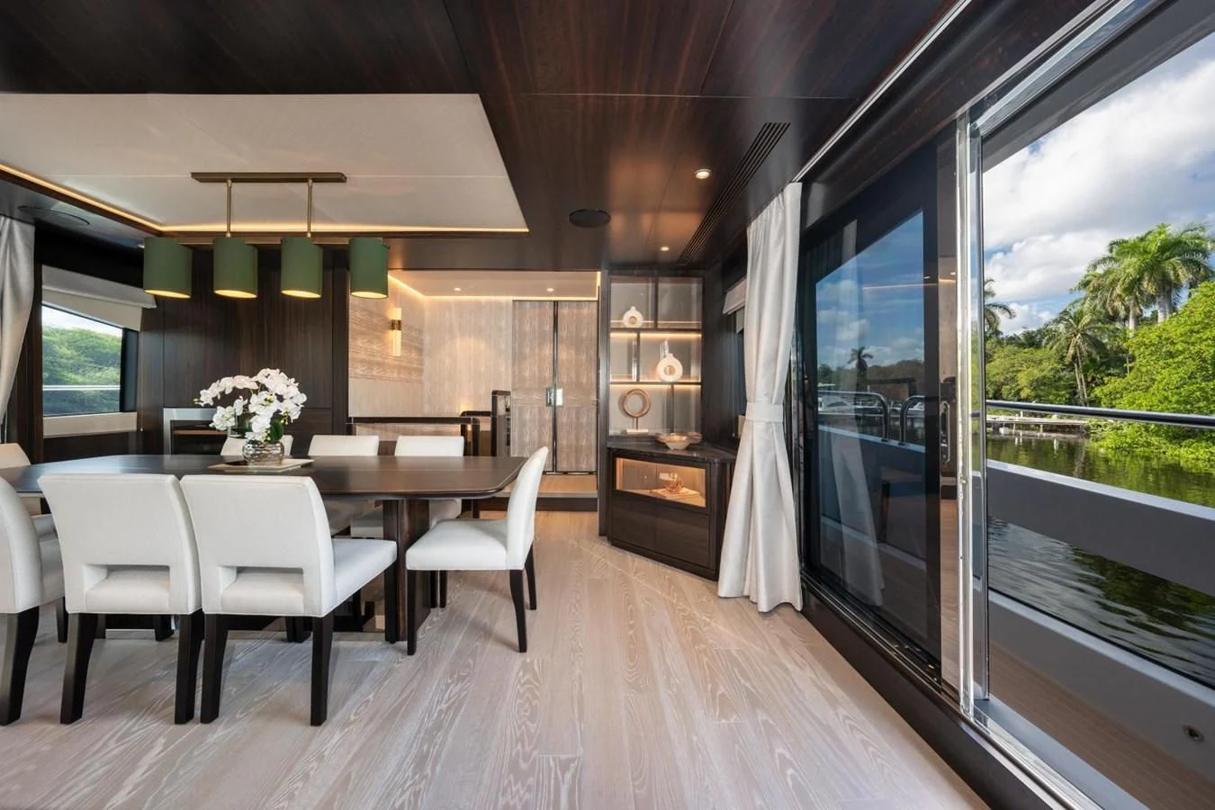 a room with a table and chairs aboard 88 YACHT Yacht for Sale