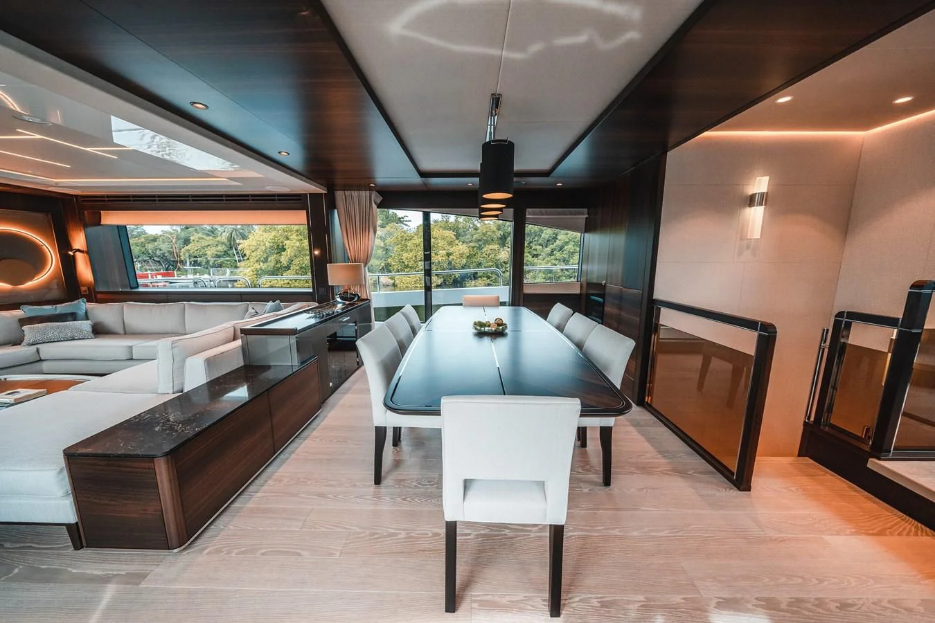 a room with a table and chairs aboard 88 YACHT Yacht for Sale