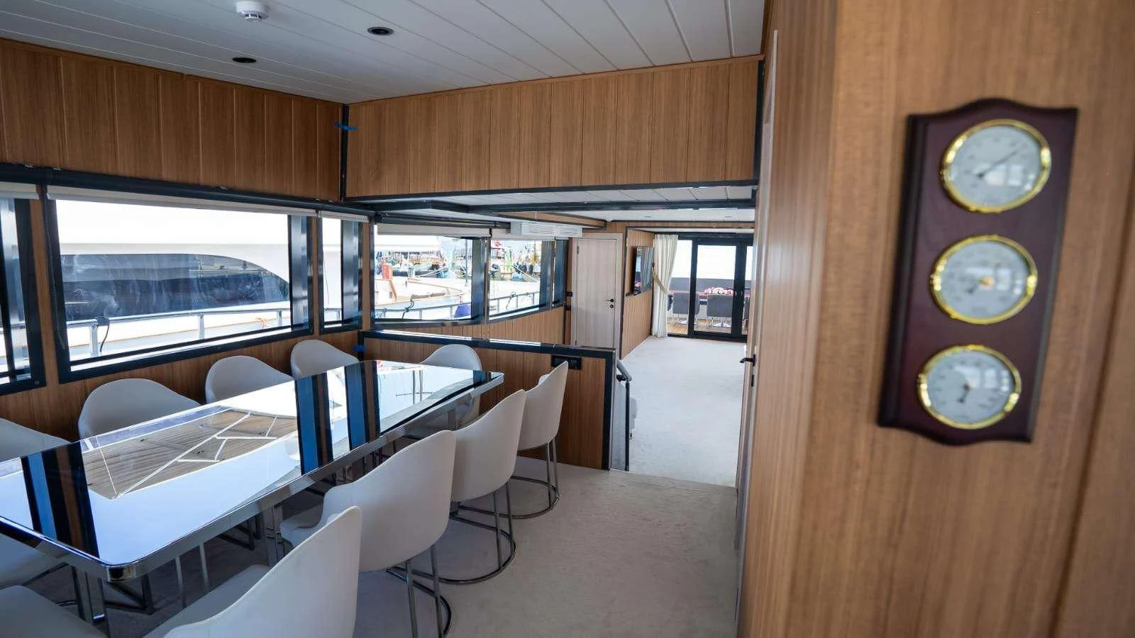a room with tables and chairs aboard 88 YACHT Yacht for Sale