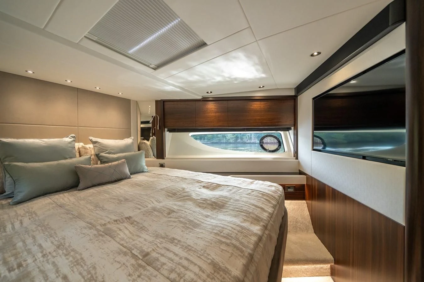 a room with a bed and a large window aboard 88 YACHT Yacht for Sale