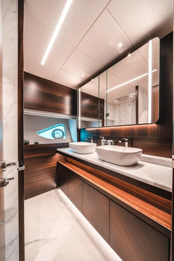 a bathroom with a large mirror aboard 88 YACHT Yacht for Sale