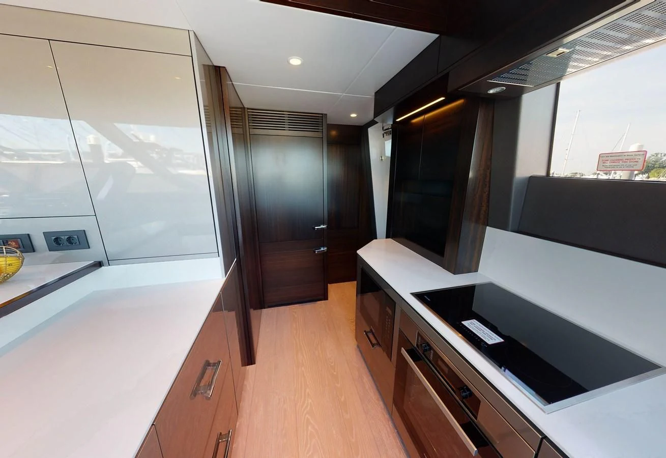 a room with a large window and a wood floor aboard 88 YACHT Yacht for Sale