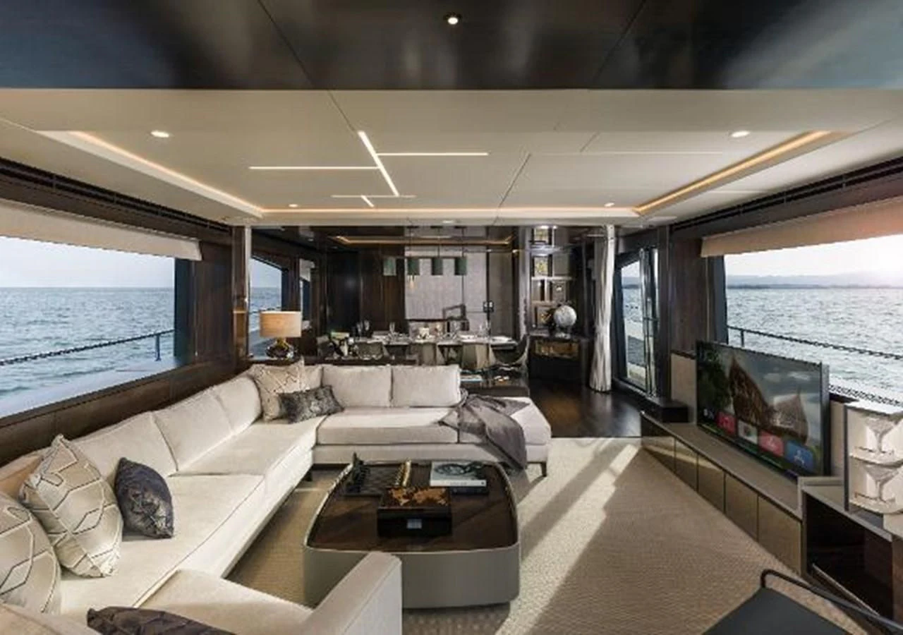 a living room with a large screen aboard 88 YACHT Yacht for Sale