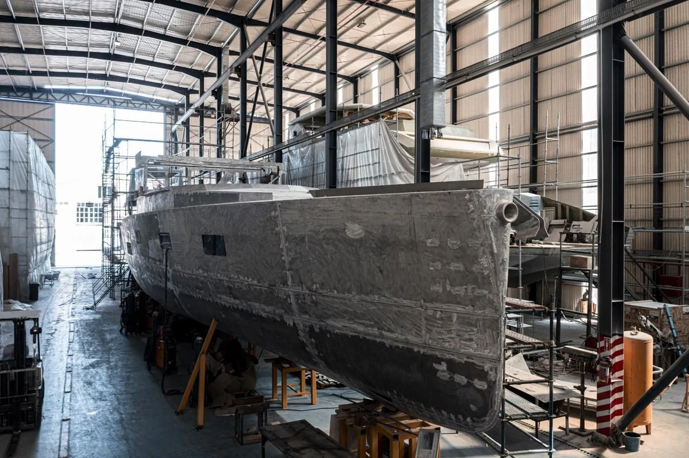 a large grey machine in a factory aboard 88 YACHT Yacht for Sale