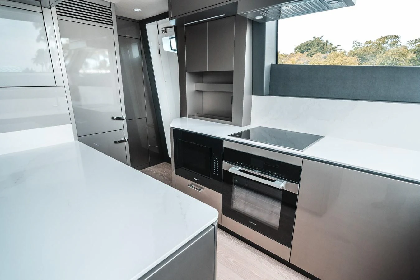 a kitchen with a large window aboard 88 YACHT Yacht for Sale