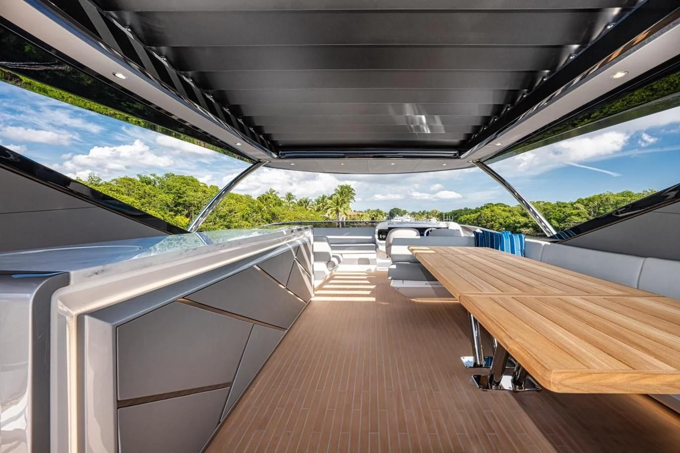 a wooden deck with a wood railing aboard 88 YACHT Yacht for Sale