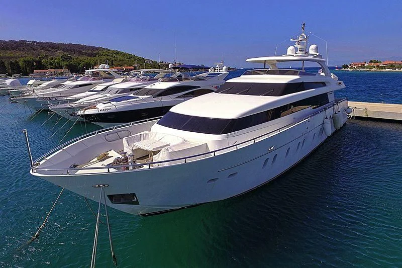 a large white boat aboard SCARABEUS Yacht for Sale