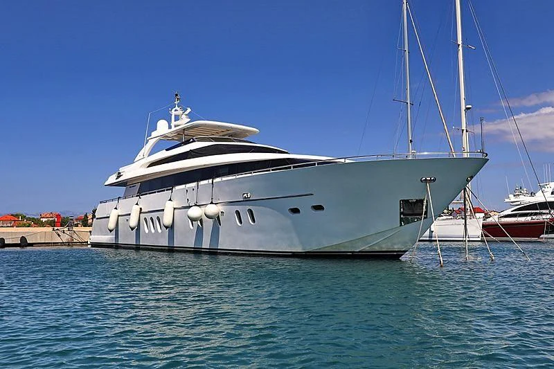 a large white boat in the water aboard SCARABEUS Yacht for Sale
