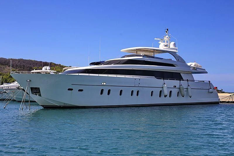 a white yacht on the water aboard SCARABEUS Yacht for Sale