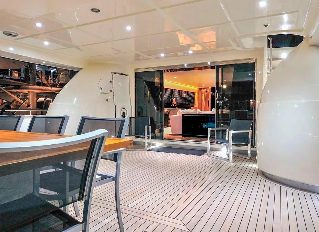 a room with tables and chairs aboard BY BUBANNY Yacht for Sale