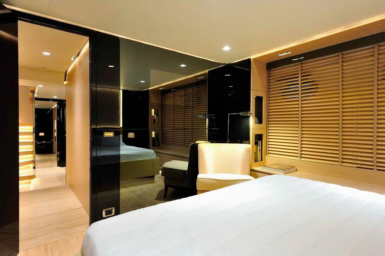 a room with a bed and a desk aboard BY BUBANNY Yacht for Sale