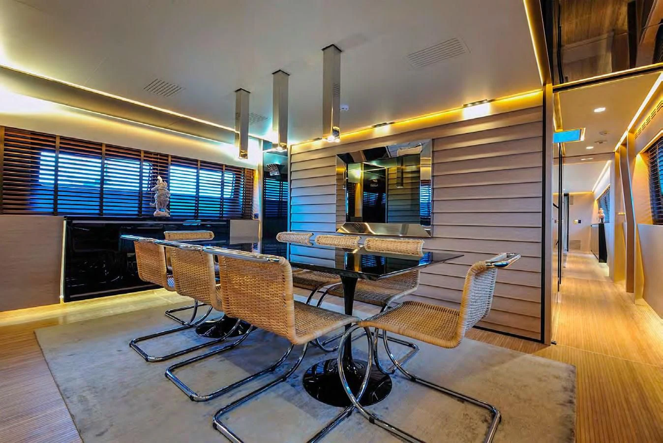 a room with a table and chairs aboard BY BUBANNY Yacht for Sale