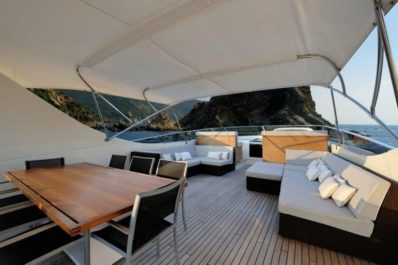 a room with a table and chairs aboard BY BUBANNY Yacht for Sale