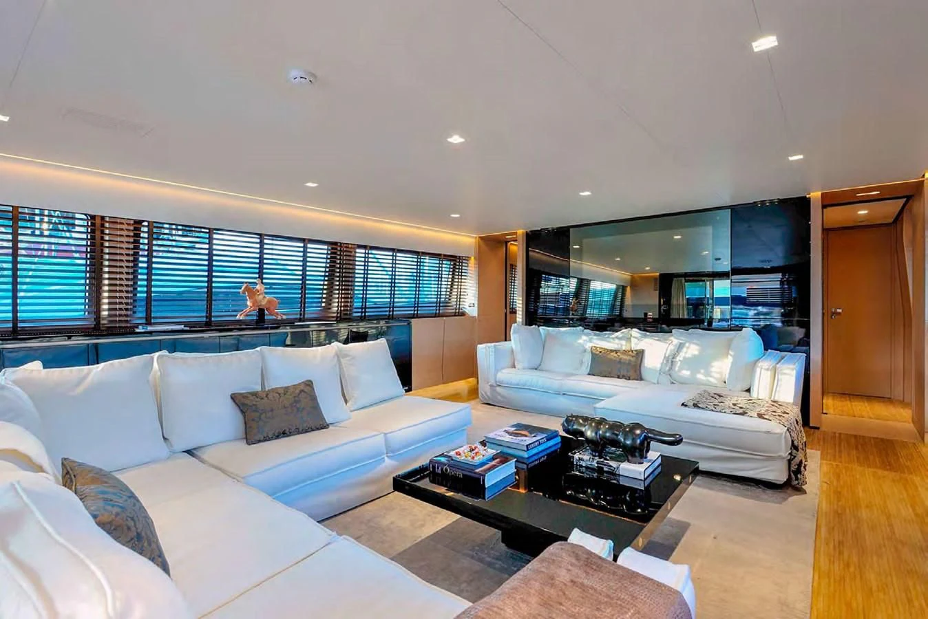 a living room with a couch and a coffee table aboard BY BUBANNY Yacht for Sale