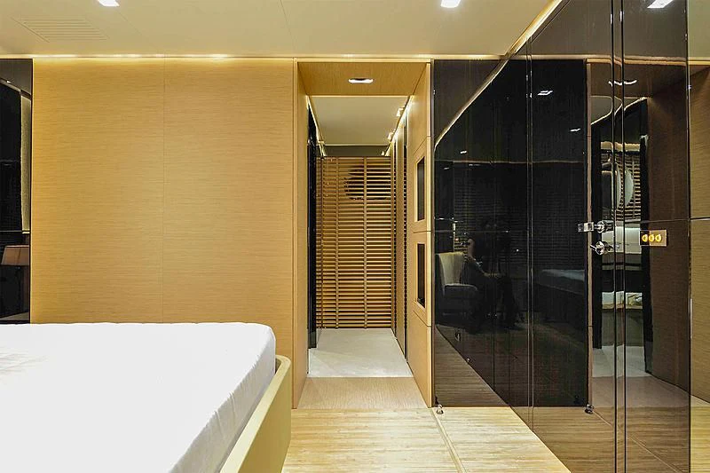 a room with a bed and a glass door aboard BY BUBANNY Yacht for Sale