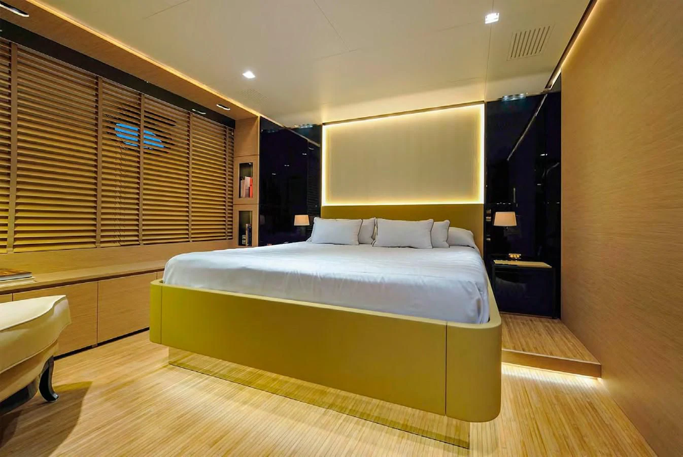 a room with a bed and a desk aboard BY BUBANNY Yacht for Sale