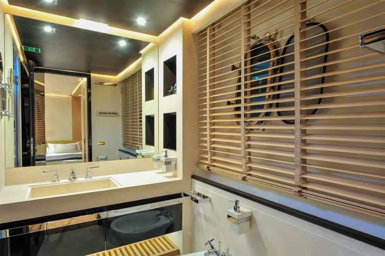 a bathroom with a large mirror aboard BY BUBANNY Yacht for Sale