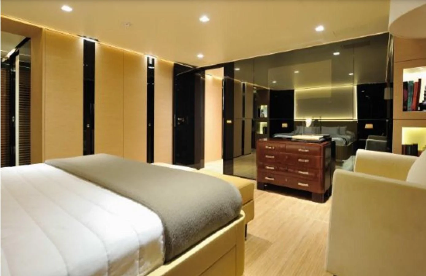 a room with a bed and a dresser aboard BY BUBANNY Yacht for Sale