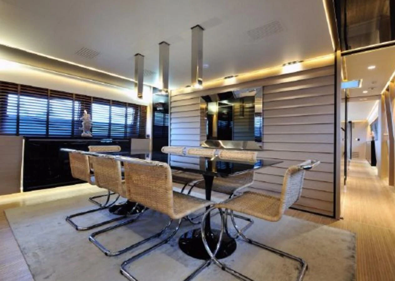 a room with a table and chairs aboard BY BUBANNY Yacht for Sale