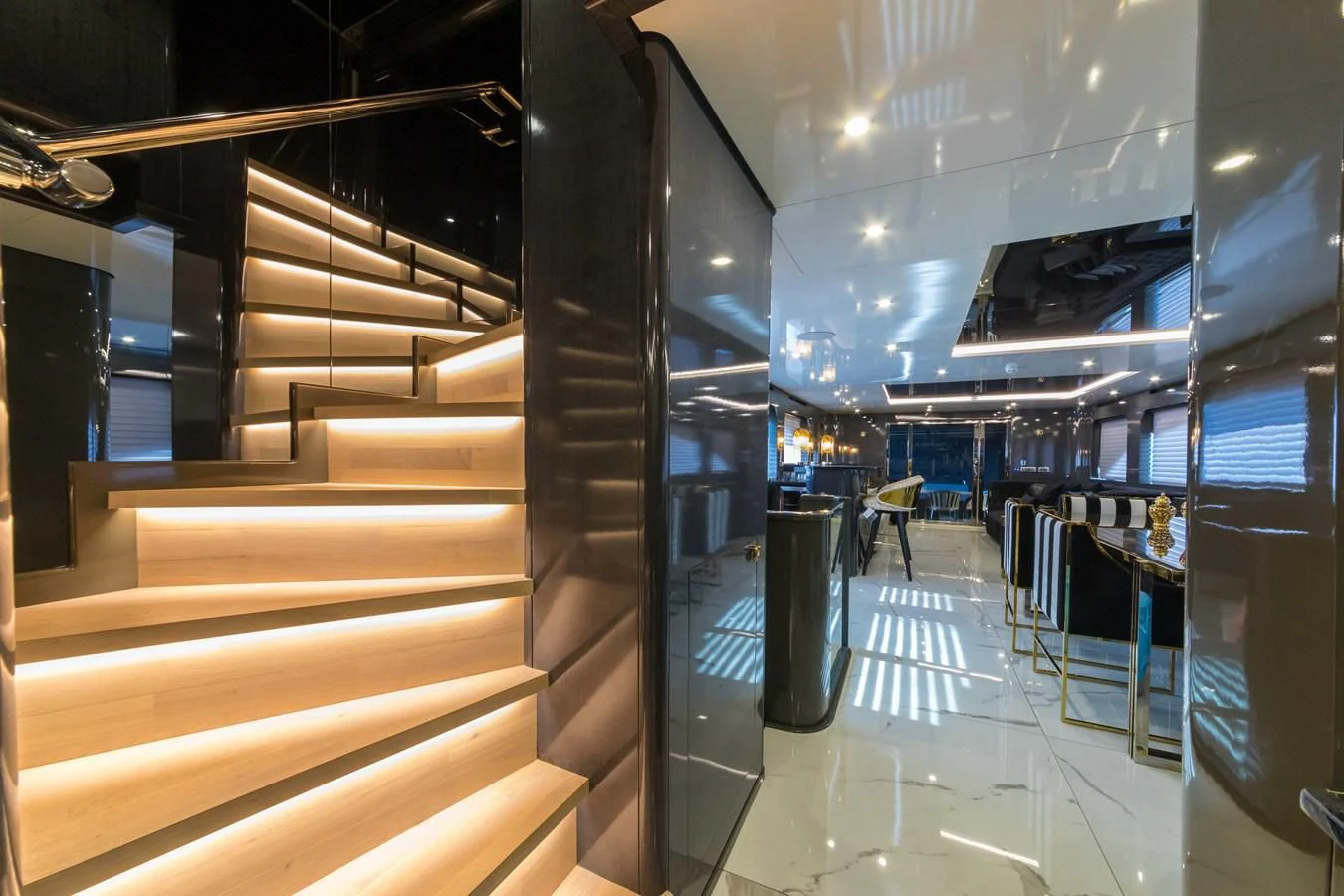 a large room with several glass doors aboard NOAM Yacht for Sale