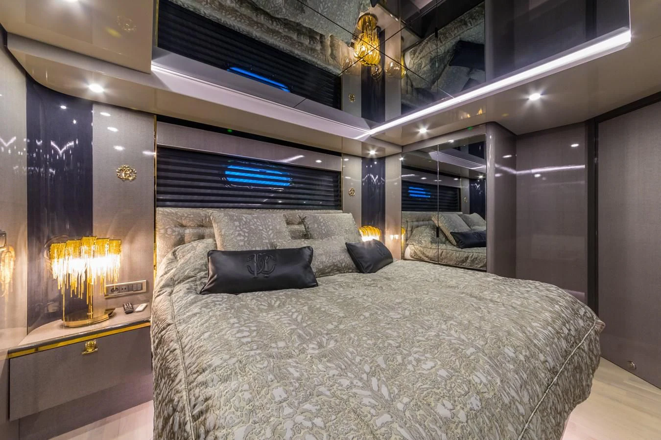 a bed in a room aboard NOAM Yacht for Sale