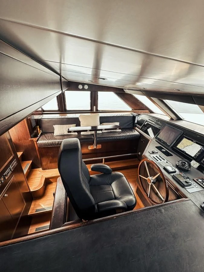 a room with a desk and a chair aboard LAZIZA Yacht for Sale