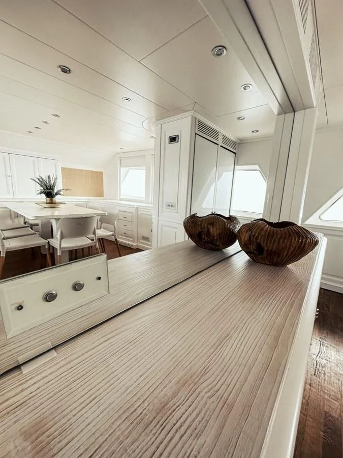 a kitchen with a wood floor aboard LAZIZA Yacht for Sale