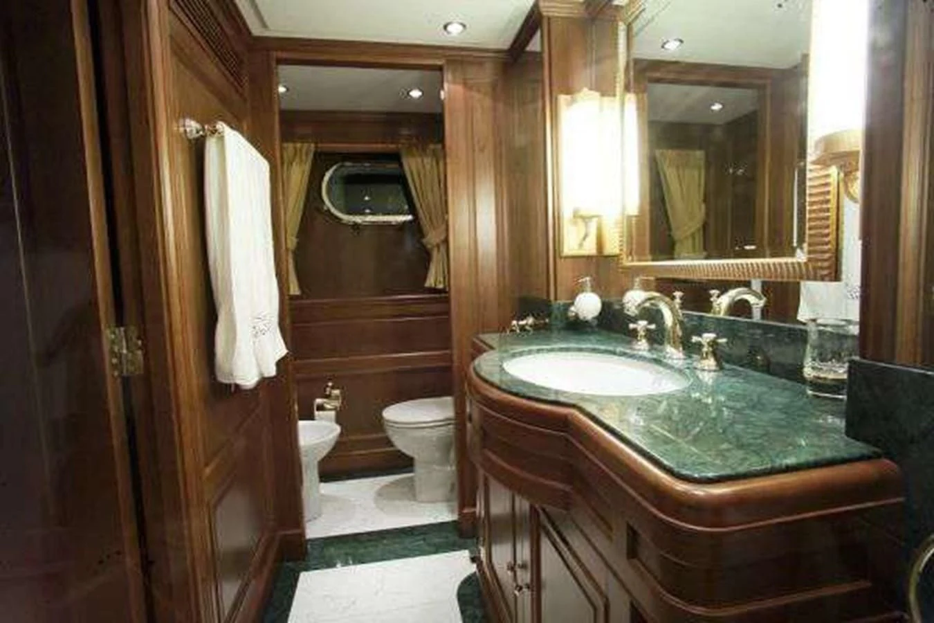 a bathroom with a marble counter aboard LADY ANN Yacht for Sale