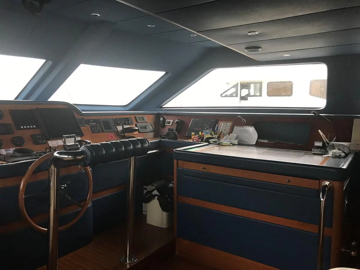 a room with a desk and a computer aboard LADY ANN Yacht for Sale