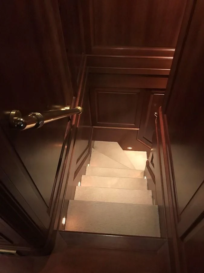 a door with a staircase aboard LADY ANN Yacht for Sale