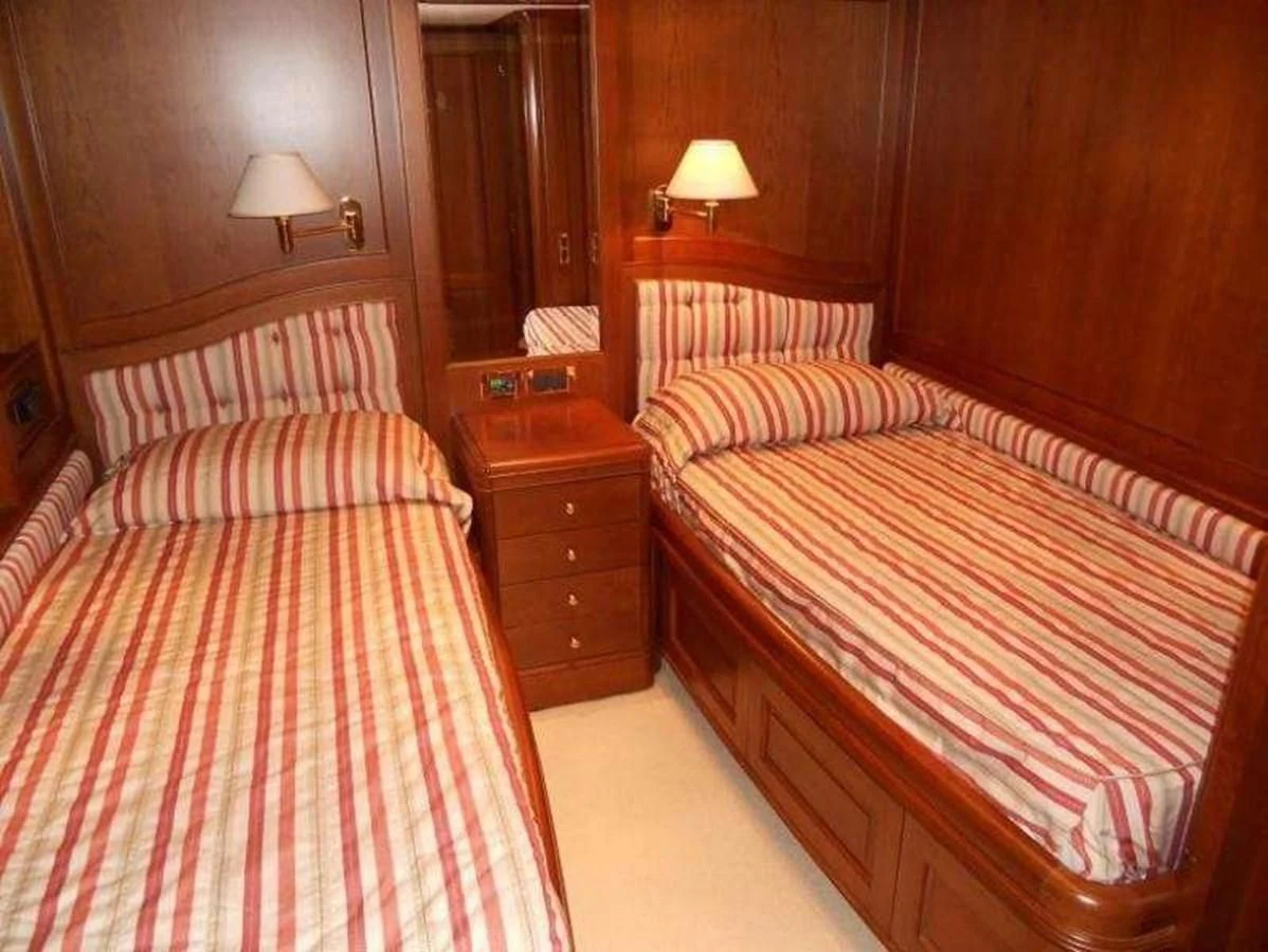 a couple of beds in a room aboard LADY ANN Yacht for Sale